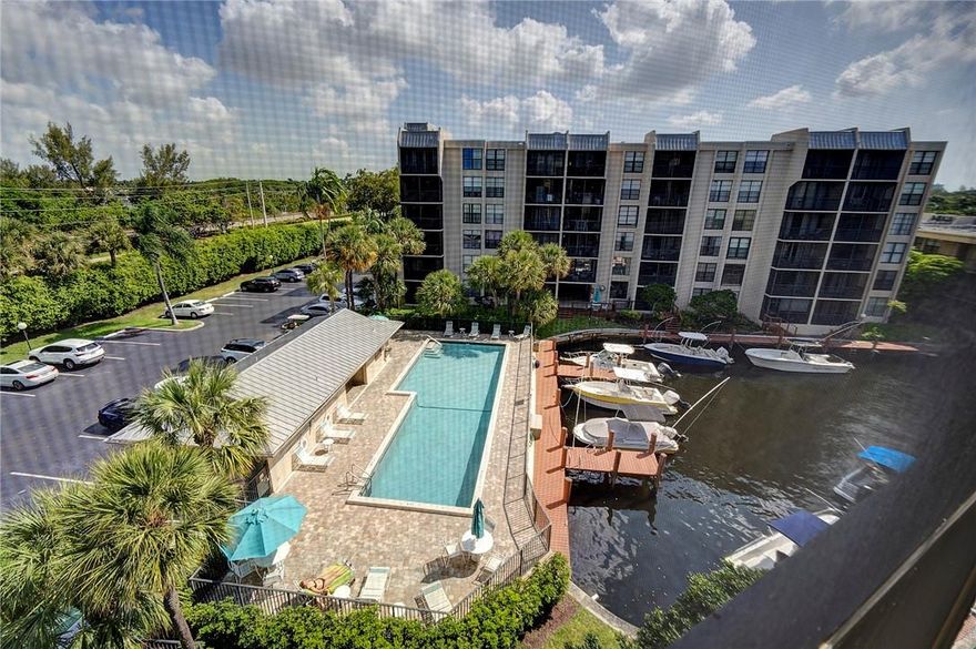 Welcome Home To This 2 Bedroom, 2 Bathroom AMAZING unit one of the ONLY UNITS WITH WASHER & DRYER IN UNIT in the HEART of Southeast Boca Raton! Located less than 2 Miles From the Beach & 5 Minutes to Mizner Park, Boca Bayou is a 24 Hour GATED development with AMENITIES GALORE! This Unit is Light & Bright and Features Tile Floor Throughout, Larger Unit with Breakfast Area, Dining Room/Living Room Combo, Split Bedroom Plan, Stackable Washer & Dryer In Unit, Completely Updated & Move In Ready With Water Views from the Front and Back! Boca Bayou has FULL RESERVES & Maintenance Fee Includes: Water, Trash, Sewer, Cable w/ HBO, Guard Gate, 5 Pools, 2 Fitness Centers, Rentable Dock Space (Call Dock master For Availability) and More!