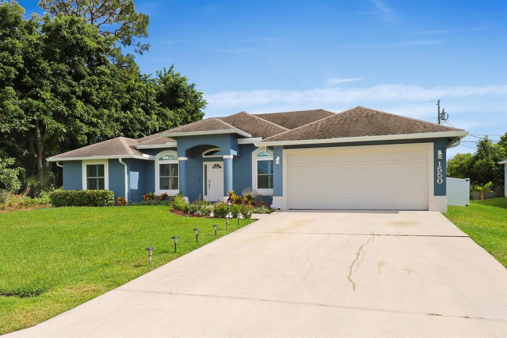 Photo of 1550 SW Iffla Avenue, Port Saint Lucie, FL 34953 (MLS # R10984514)