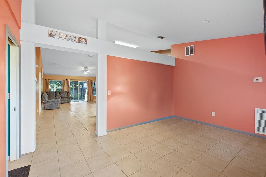 Photo of 3182 SW Cathedral Street, Port Saint Lucie, FL 34953 (MLS # R11093056)