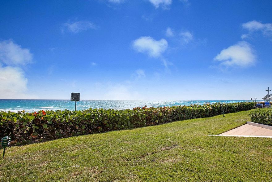 Spacious, bright, state-of-the art, all describe this outstanding condo on the ocean. Upon entering, you will be taken by the direct views of the ocean.  Start your day watching the sunrise over the waves of the Atlantic from your private Oceanside patio and relax at the end of the day while watching the sunset over the Intracoastal from your wrap around balcony.With walls of floor to ceiling glass doors throughout, light pours into this fully renovated home. This kitchen is a work of art with high gloss custom cabinetry and top of the line appliances including a Thermador double wall oven, a Sub-Zero refrigerator and a Sub-Zero wine cooler, and a wall unit Miele Nespresso maker. In the great room, with coffered ceiling, conversation and company easily flow between the living and dining