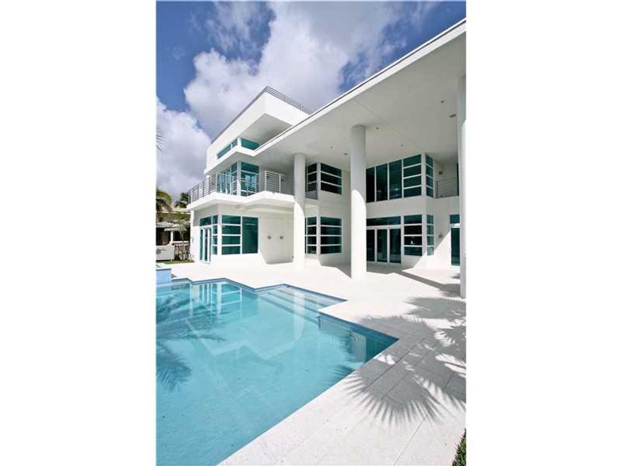 WOW!!!LUXURIOUS IN EVERY WAY - POSSIBLY THE BEST WATER VIEWS EVER!!!INSULATED IMPACT GLASS, GLASS ELEVATOR, WHOLE HOUSE GENERATOR, 1,000 ST ROOFTOP TERRACE, CONCRETE DOCK WITH PIER WITH PLENTY OF ROOM FOR ALL THE TOYS, IDEAL FOR GRAND SCALE ENTERTAING OR  SERENE LIVING AT IT'S BEST!! HUGE COVERED LOGGIA, IDEAL FOR GRAND SCALE ENTERTAINING OR SERENE LIVING AT IT'S BEST!!