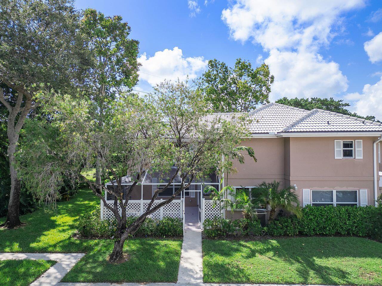 This beautifully remodeled townhome with a newly renovated kitchen has white wood Shaker cabinetry, quartz counters & brand new stainless LG appliances. The first floor features the living, dining area, 1/2 bath & laundry (new washer/dryer). Beautiful neutral tile laid in a staggered pattern is throughout the main level. There's an impact slider off the kitchen & another impact window in the living room. All other windows (w/ exception of upstairs BA) have accordian shutters. The 2nd floor features neutral laminate flooring, two generous sized bedrooms w/ ensuite remodeled bathrooms. No popcorn ceilings throughout! Located in a peaceful setting on a quiet cul-de-sac, Stamford at the Villages of Palm Beach is close to the Palm Beach Outlet Mall & lots of great restaurants.