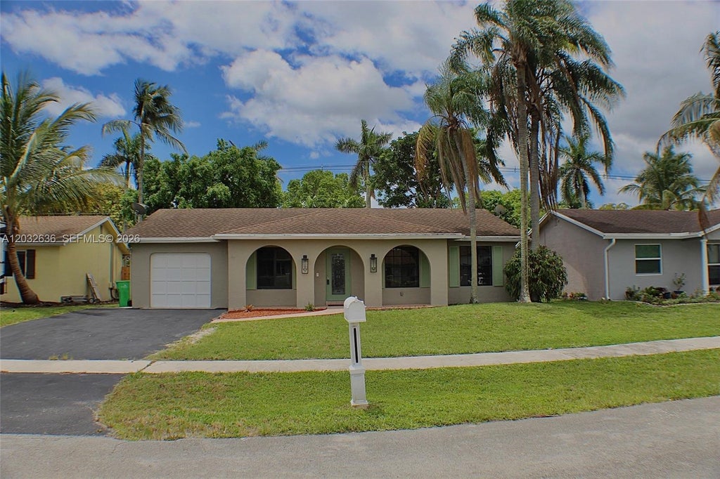 Photo of 10784 NW 23rd Court, Sunrise, FL 33322 (MLS # A12032636)