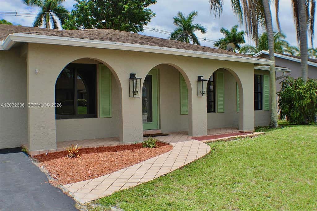 Photo of 10784 NW 23rd Court, Sunrise, FL 33322 (MLS # A12032636)