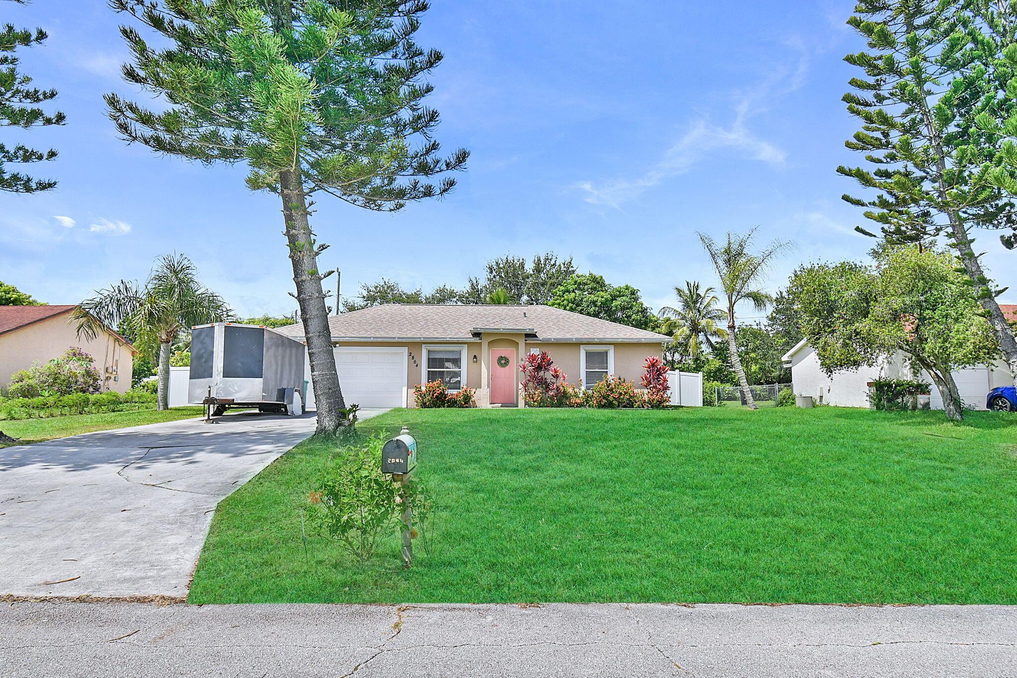 Live the Florida Lifestyle in this Inviting CBS Pool Home. A Must-See, this Solid 3 Bedroom, 2 Bath, 2-Car Garage home was Mostly Updated in 2021. Features include a Sparkling Above-Ground Pool, Beautiful Kitchen with 2 Pantries, newer Roof (2021), newer A/C (2021), uniform Tile Flooring throughout, Linen Closet, Covered Back Patio, Fully Fenced (2021) backyard with mature Coconut and Mango Trees, 10x10 Shed (2021) for extra storage and a full set of panel Storm Shutters. Located just minutes from Shopping, Dining and Everyday Essentials this property is ready to welcome you home.