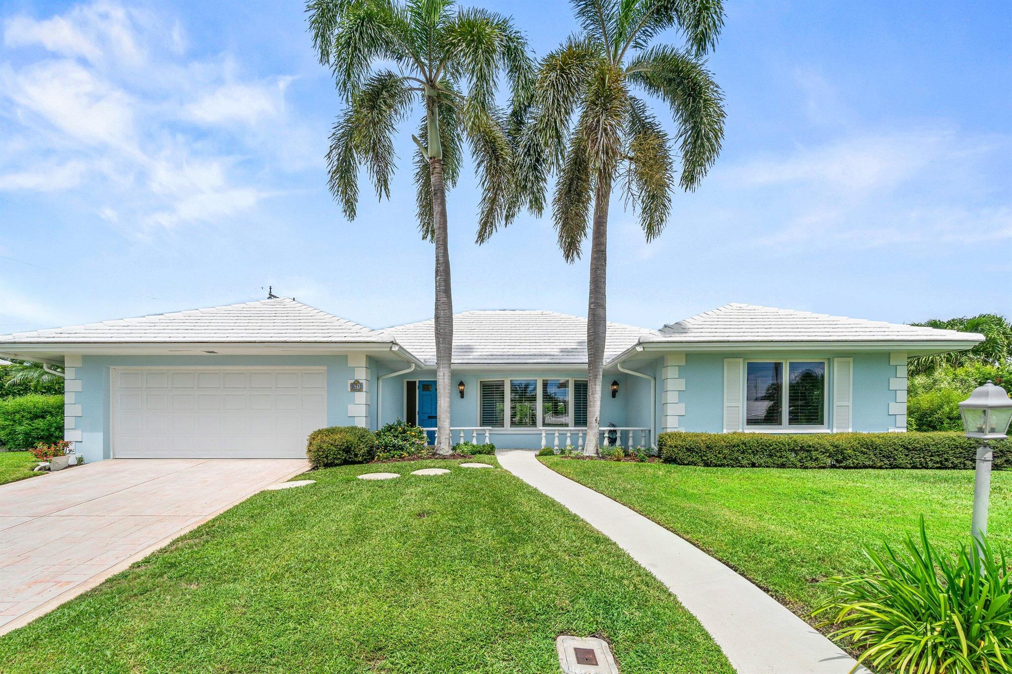 Spectacular home in highly sought-after Camino Gardens! This oversized 2-bedroom, 2-bathroom floor plan, offering 1,913 sq. ft. under air, 3,168 total sq. ft., and situated on a spacious 10,237 sq. ft. lot with fantastic curb appeal, beautiful landscaping and high elevation. Interior highlights include the large main living area has Saturnia flooring and plantation shutters, accented by an open kitchen with white cabinets and granite countertop, the large bedrooms have light terrazzo flooring and large closets. The versatile layout features a combined living & dining area, separate family room, large inside utility room, and expansive covered patio with screen overlooking the pool and fenced yard--perfect for entertaining!Recent updates: HVAC (2024), flat roof (2020), and complete