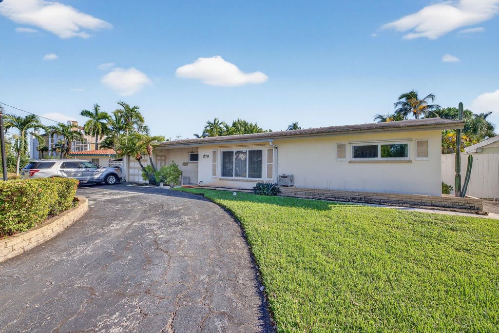 Photo of 1570 NE 30TH Place, Oakland Park, FL 33334 (MLS # B26056156)