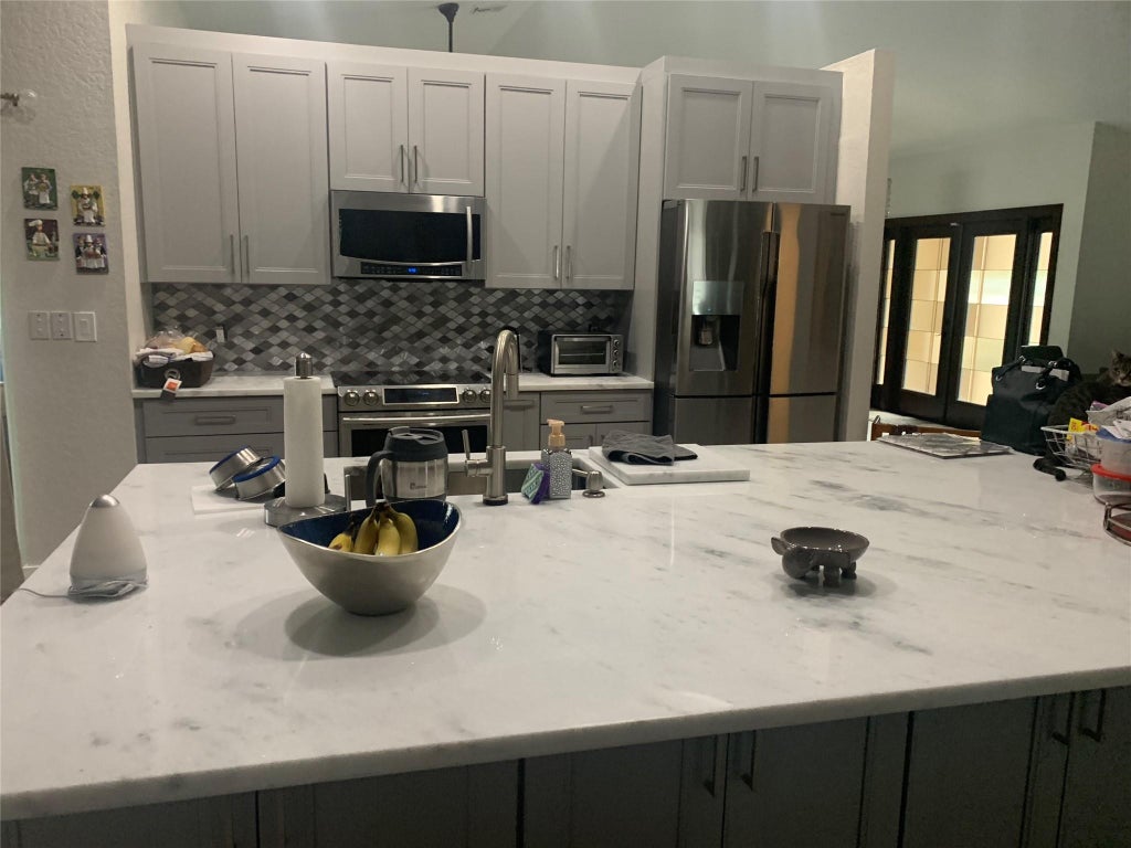 Photo of 5015 NW 104th Way, Coral Springs, FL 33076 (MLS # F10530780)