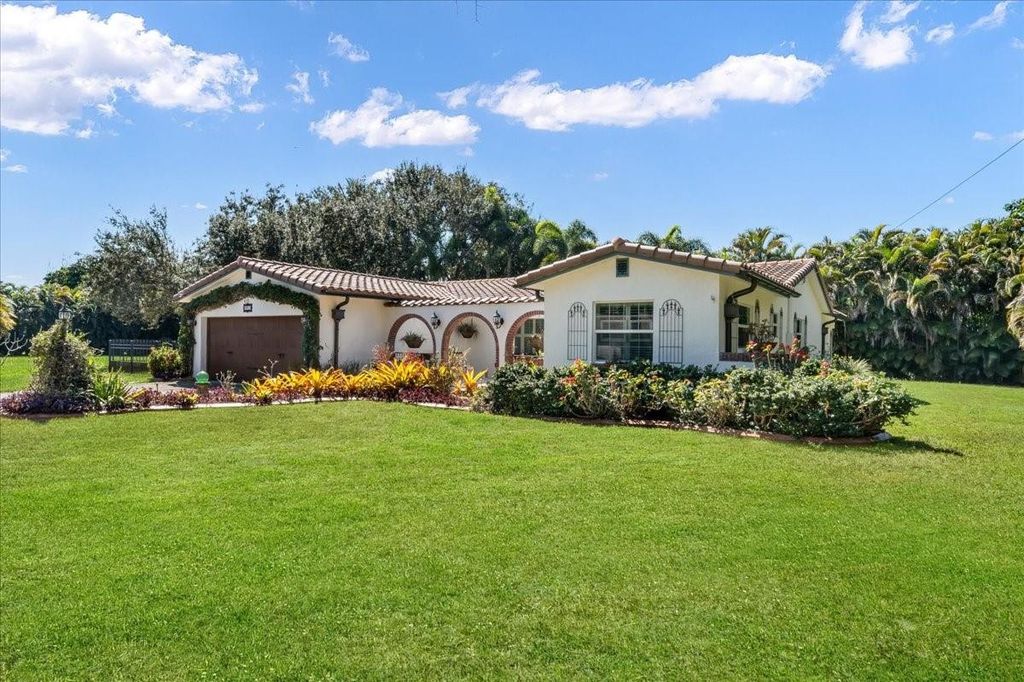 Photo of 901 NW 116th Terrace, Plantation, FL 33325 (MLS # F10554869)