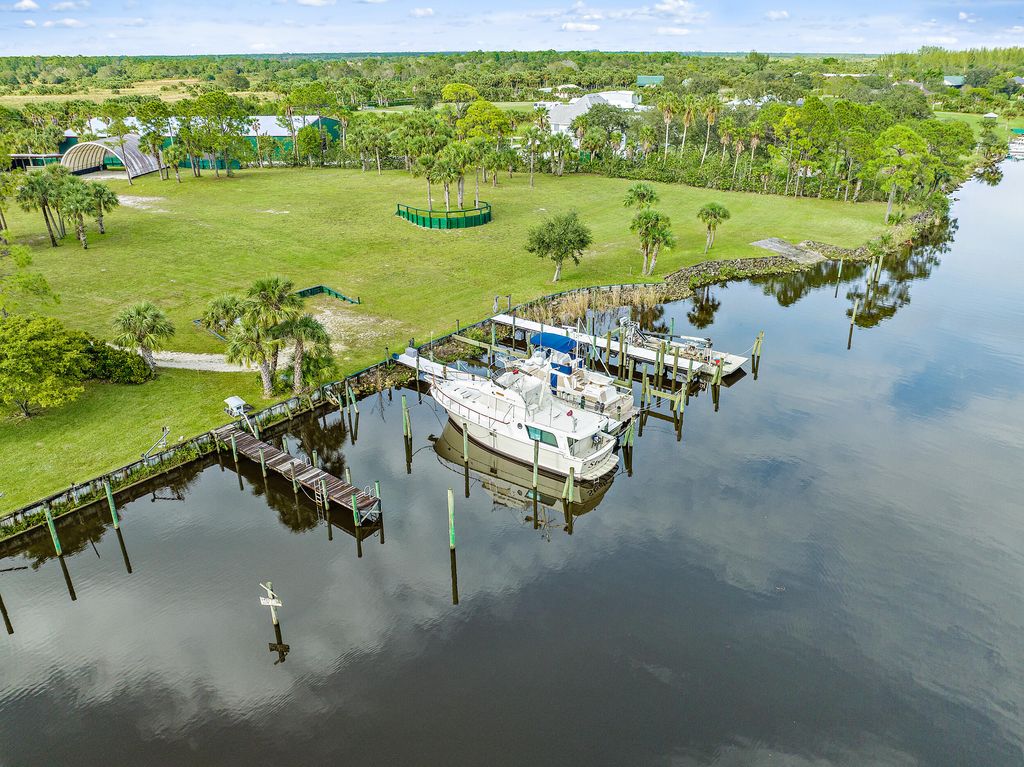 Photo of 10275 SW Green Ridge Lane, Palm City, FL 34990 (MLS # R10848276)