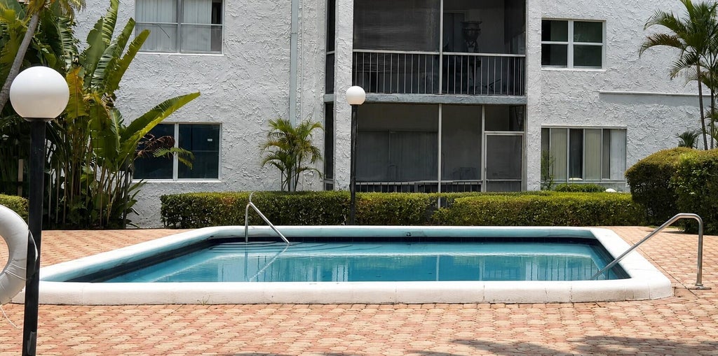 Photo of 3360 SPANISH MOSS Terrace #313, Lauderhill, FL 33319 (MLS # B26057288)