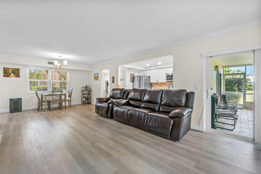 Photo of 5510 Tamberlane Circle #144, Palm Beach Gardens, FL 33418 (MLS # R10918149)