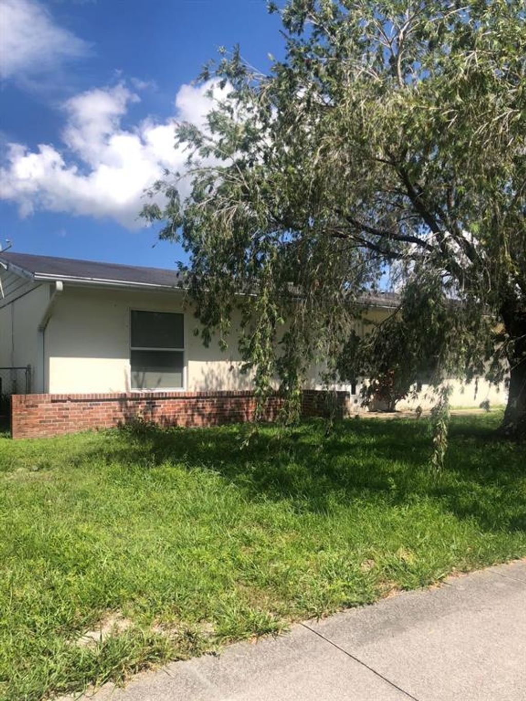 Photo of 223 NE Airoso Boulevard Blvd, Port Saint Lucie, FL 34983 (MLS # R10823312)