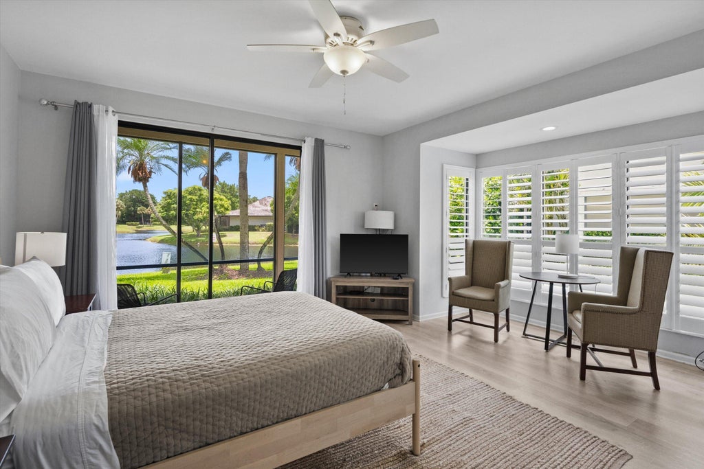 Photo of 11842 Pebblewood Drive #102, Wellington, FL 33414 (MLS # B26035821)