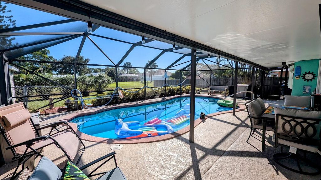 Photo of 2169 SE Dolphin Road, Port Saint Lucie, FL 34952 (MLS # R11039891)