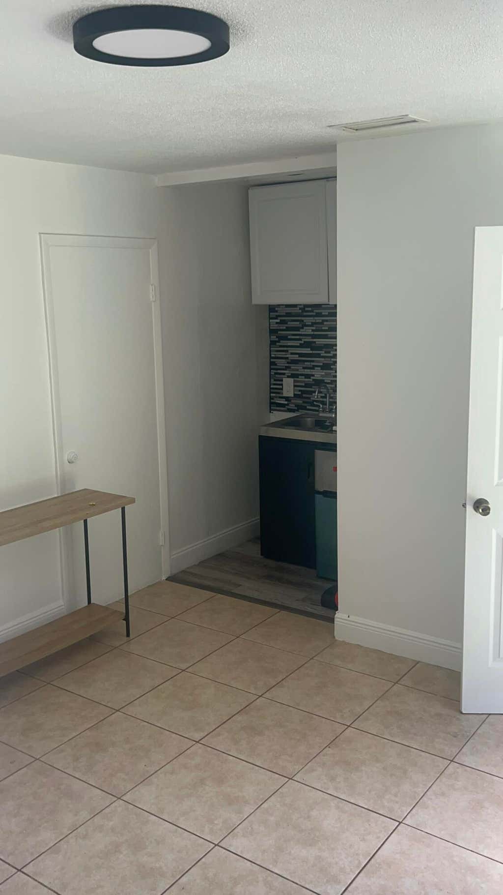 Photo of 810 NW 40TH ST #1-3, Oakland Park, FL 33309 (MLS # B26068652)