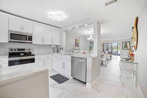 Photo of 6149 Pointe Regal Circle #104, Delray Beach, FL 33484 (MLS # B26003233)