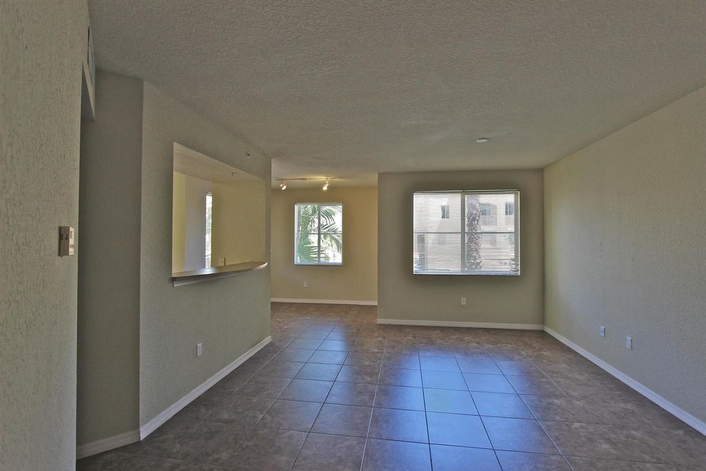 Photo of 11017 Legacy Lane #206, Palm Beach Gardens, FL 33410 (MLS # R10984604)