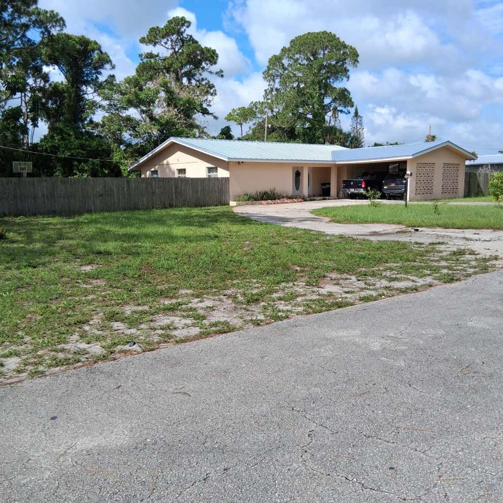 Photo of 3303 S Avenue S, Fort Pierce, FL 34947 (MLS # B26037170)