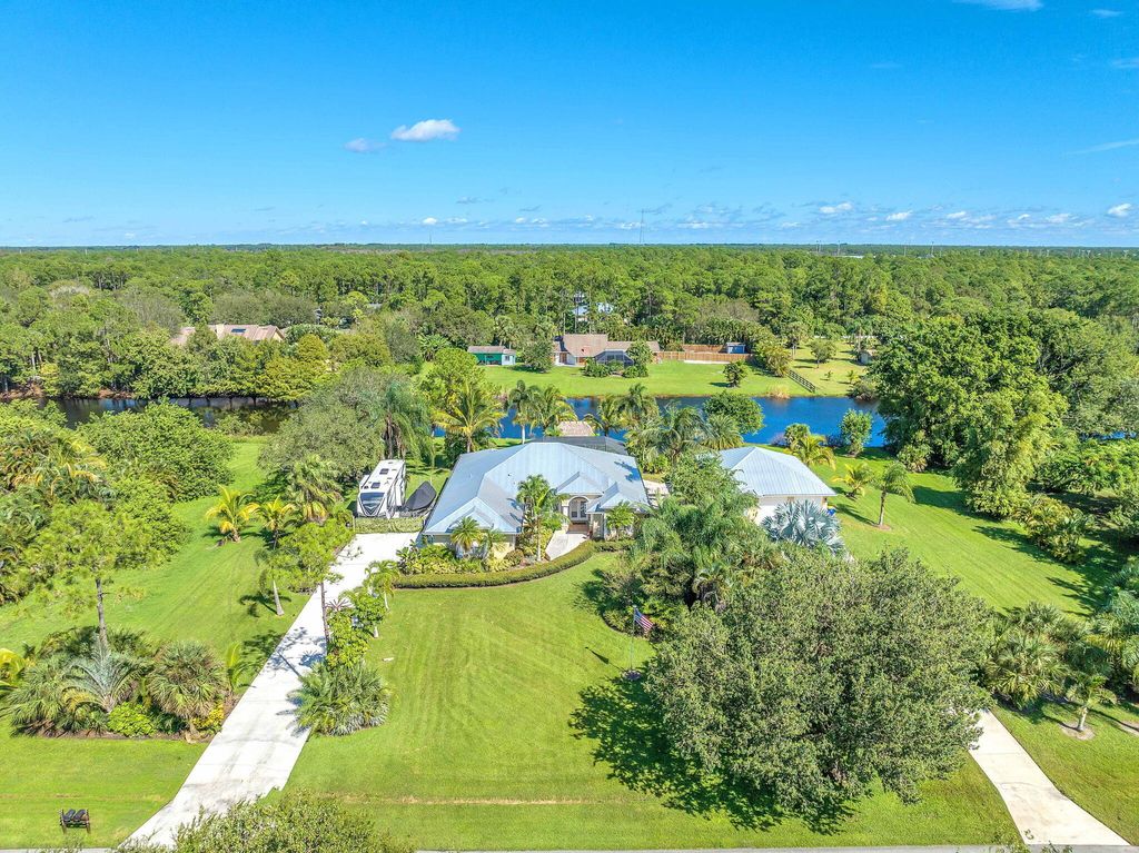 Photo of 11566 SW Meadowlark Circle, Stuart, FL 34997 (MLS # R10983254)