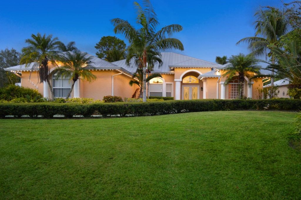 Photo of 11566 SW Meadowlark Circle, Stuart, FL 34997 (MLS # R10983254)