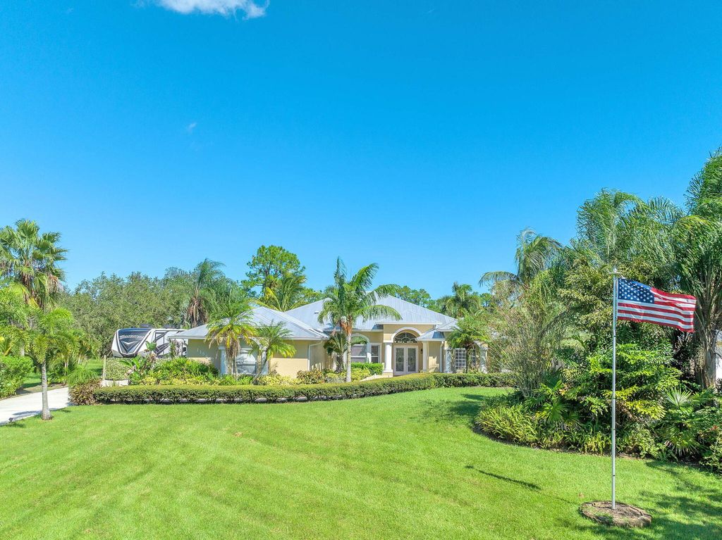 Photo of 11566 SW Meadowlark Circle, Stuart, FL 34997 (MLS # R10983254)