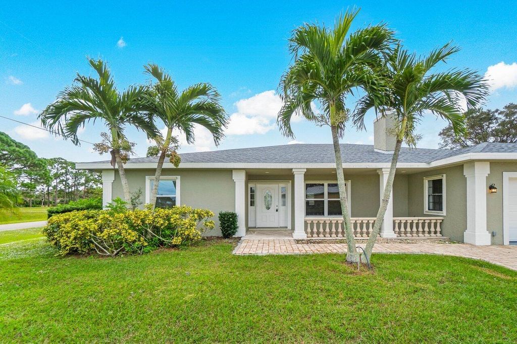 Photo of 2302 SE Calcutta Circle, Port Saint Lucie, FL 34952 (MLS # R10970317)