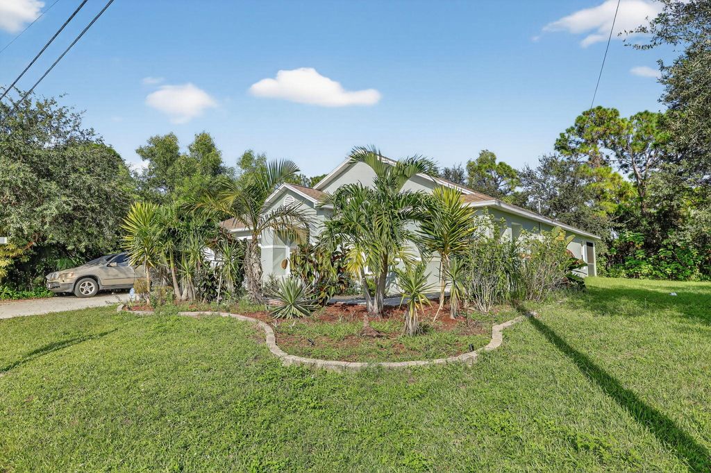 Photo of 3331 SW Espanola Street, Port Saint Lucie, FL 34953 (MLS # R11150487)