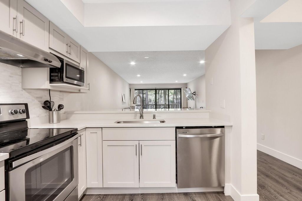 Photo of 133 Brackenwood Road, Palm Beach Gardens, FL 33418 (MLS # R11122414)