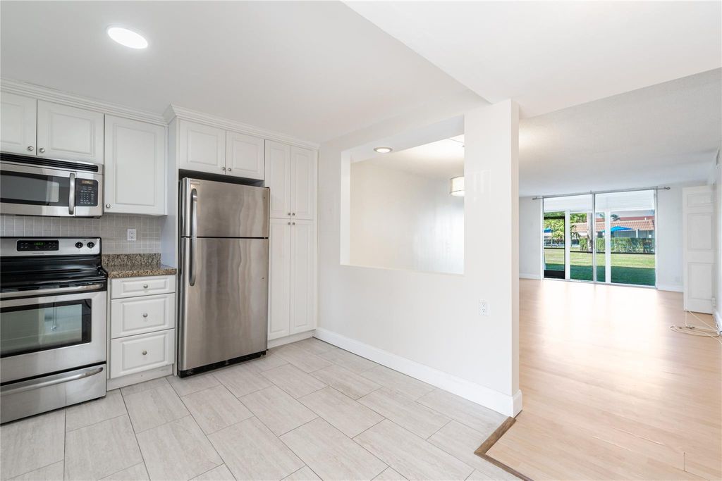 Photo of 9523 S Hollybrook Lake Drive #107, Pembroke Pines, FL 33025 (MLS # B26006028)