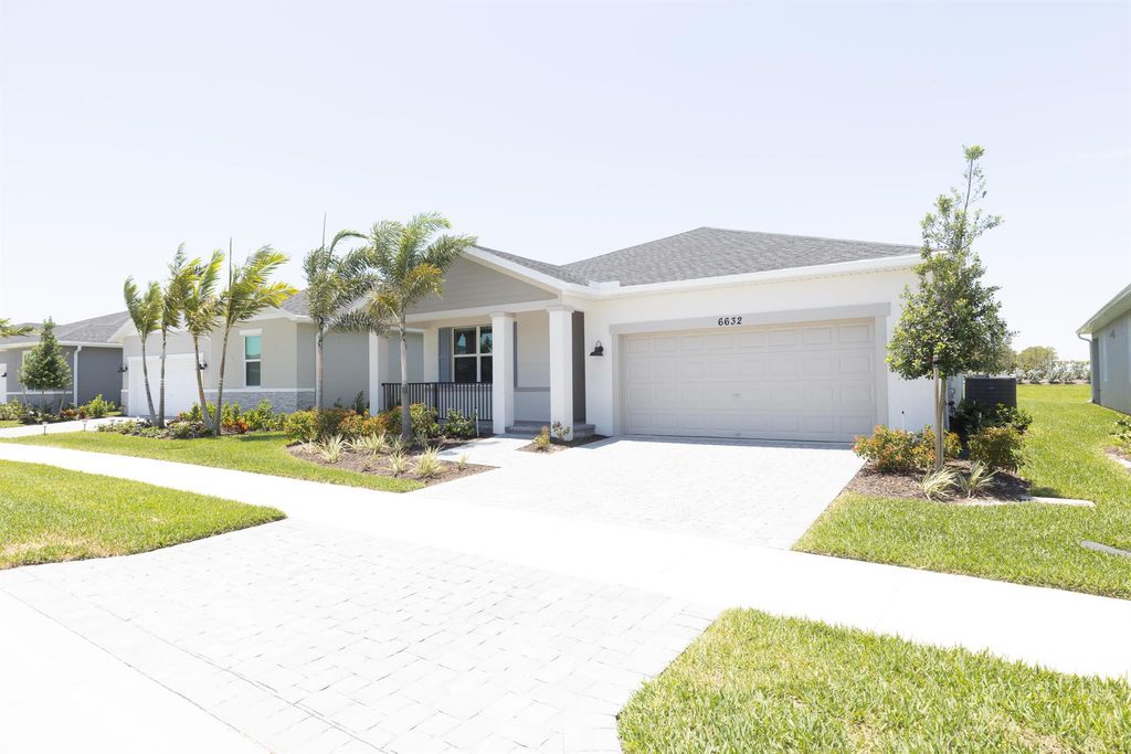Photo of 6632 NW Cloverdale Avenue, Port Saint Lucie, FL 34987 (MLS # R11078069)