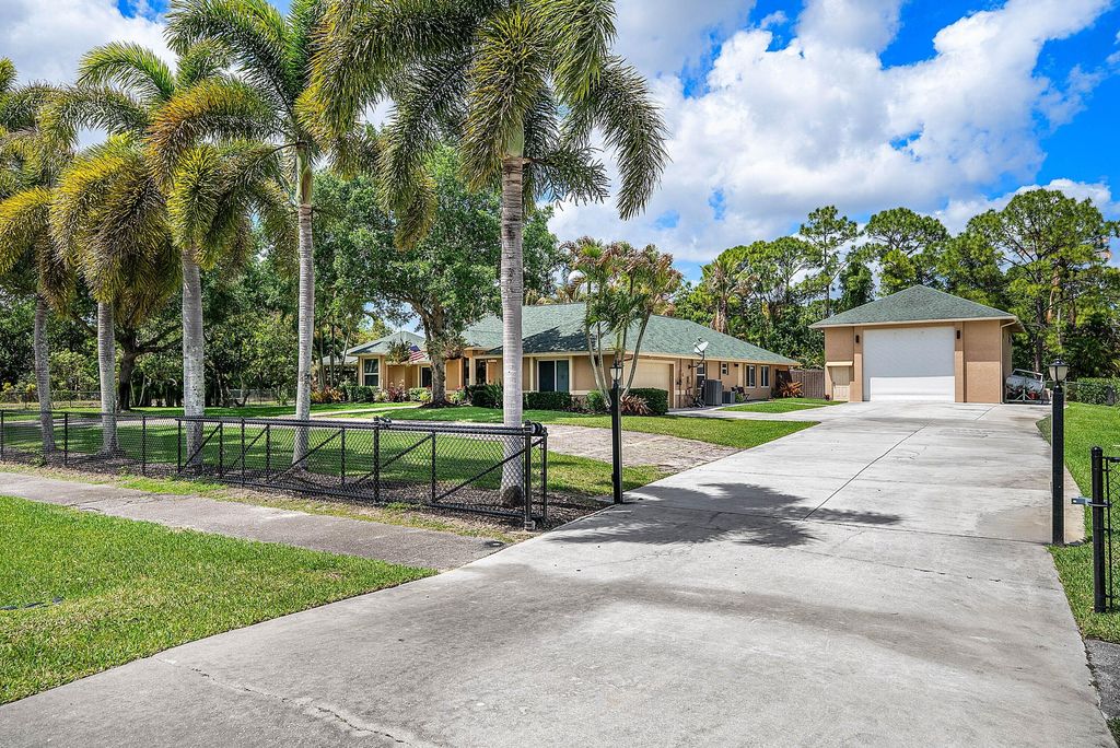 Photo of 14719 Temple Boulevard, The Acreage, FL 33470 (MLS # B26014988)