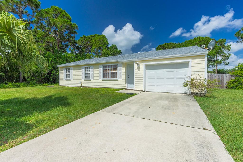 Photo of 2318 SE Newcastle Ter Terrace Ter, Port Saint Lucie, FL 34952 (MLS # R10815523)