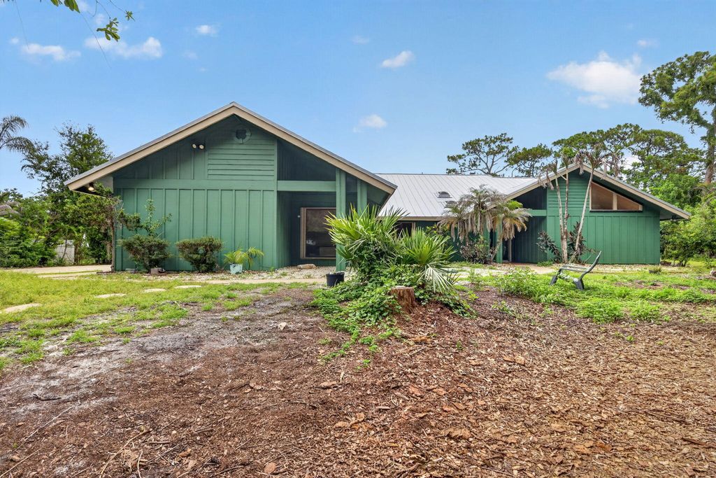 Photo of 2111 SW Racquet Club Drive, Palm City, FL 34990 (MLS # B26039471)