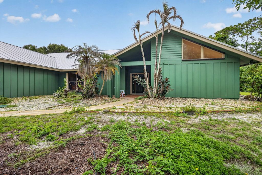 Photo of 2111 SW Racquet Club Drive, Palm City, FL 34990 (MLS # B26039471)