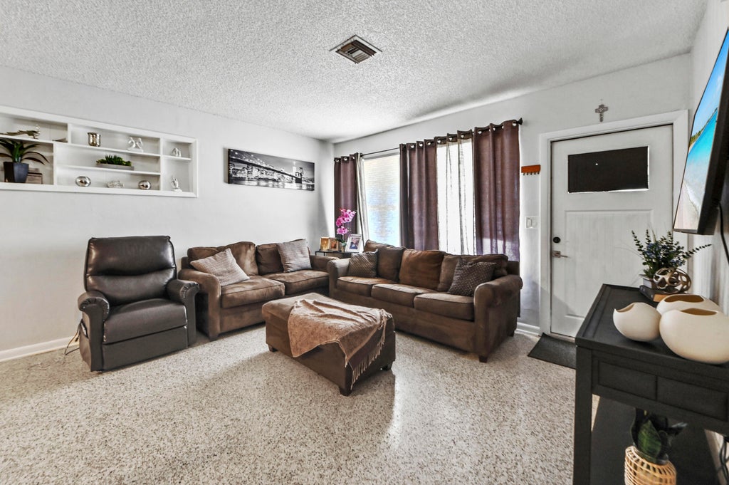 Photo of 149 Cayman Drive, Palm Springs, FL 33461 (MLS # B26069448)
