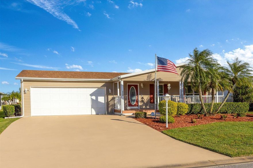 Welcome Home to this lakefront property in the Savanna Club 55+ community. This spacious 1,768 sq. ft. gem offers 3 BR's, 2 BA's, and a 2-car gar.. The island kitchen is perfect for entertaining, with modern finishes and ample counter space. Tiled and vinyl floors make it both stylish and easy to maintain. Enjoy the outdoors on the 14 x 20 lanai with views of the lake. The home has recent updates including a 2018 roof, 2025 A/C, updated retaining wall, vapor barrier, straps, and insulation under the home for added peace of mind. The included golf cart makes it easy to explore the community and nearby amenities and the furnishings are negotiable. Don't miss the opportunity to experience this incredible lakefront home in the Savanna Club! Land Lease Property
