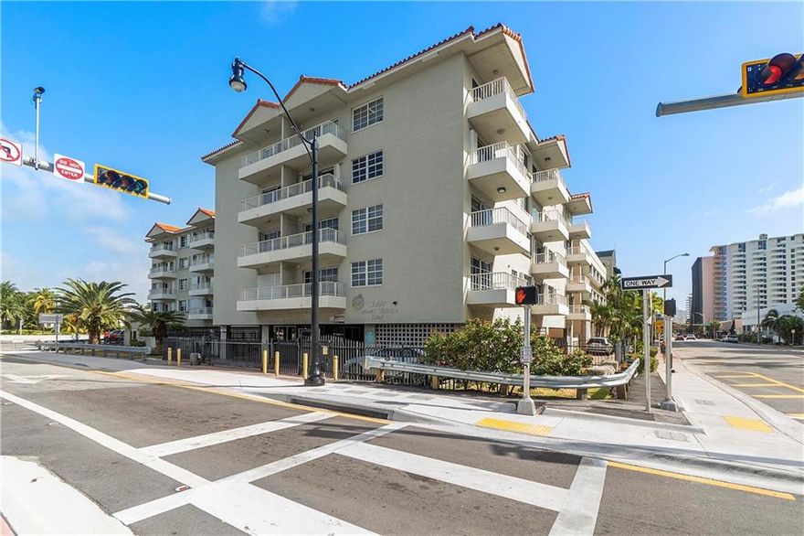 Sitting pretty in Miami Beach sits this spacious, generously illuminated corner unit next to the intercoastal and only steps away from the beach. It not only boasts a large living room space but also 2 balconies with access from one of the rooms and living area. The apartment feels homie and the neutral colors set a welcoming and warming tone to the whole apartment. The building is very well situated with gate and secure parking/cover parking, and is a great place to call home or keep it as an investment.  LAST 2/2 SOLD IN BUILDING FOR 410K. NO SHORT-TERM RENTALS.