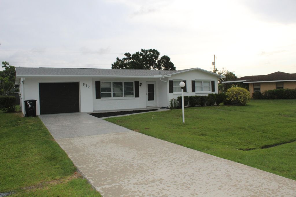 Photo of 577 SE Anchor Lane, Port Saint Lucie, FL 34983 (MLS # R11116329)