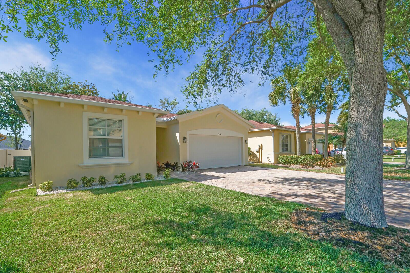 Not available before 10-15-2025 per HOA. Beautiful, remodeled home in Sunterra. Everything is new from the appliances to the air conditioner. New cabinets, countertops, and gray plank flooring throughout. Fresh paint on walls, ceilings, Even the epoxy garage floor paint in new. Plus, all new hurricane windows. Open patio and private fenced back yard.