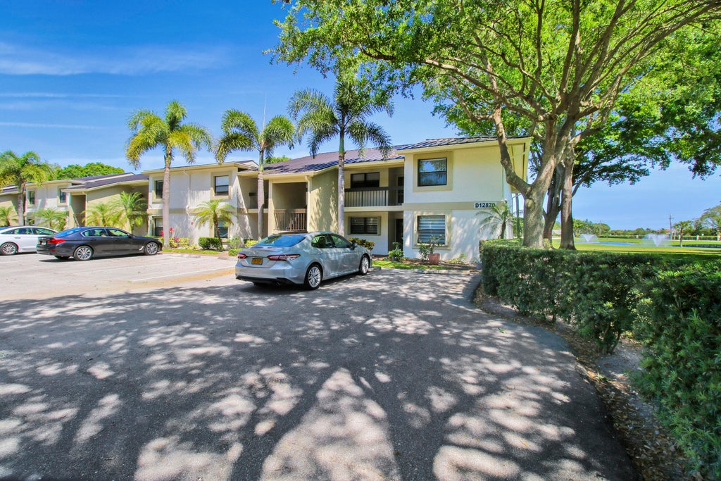 Photo of 12870 Briarlake Drive #204, Palm Beach Gardens, FL 33418 (MLS # R10977293)