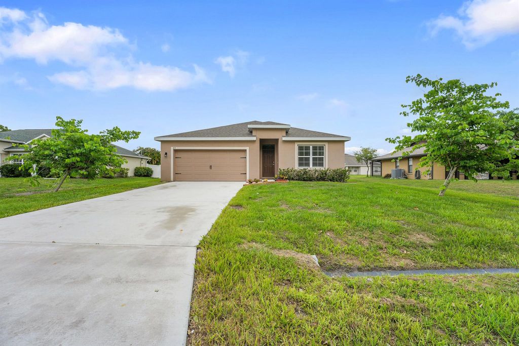 Photo of 433 SW Eyerly Avenue, Port Saint Lucie, FL 34983 (MLS # R11097972)
