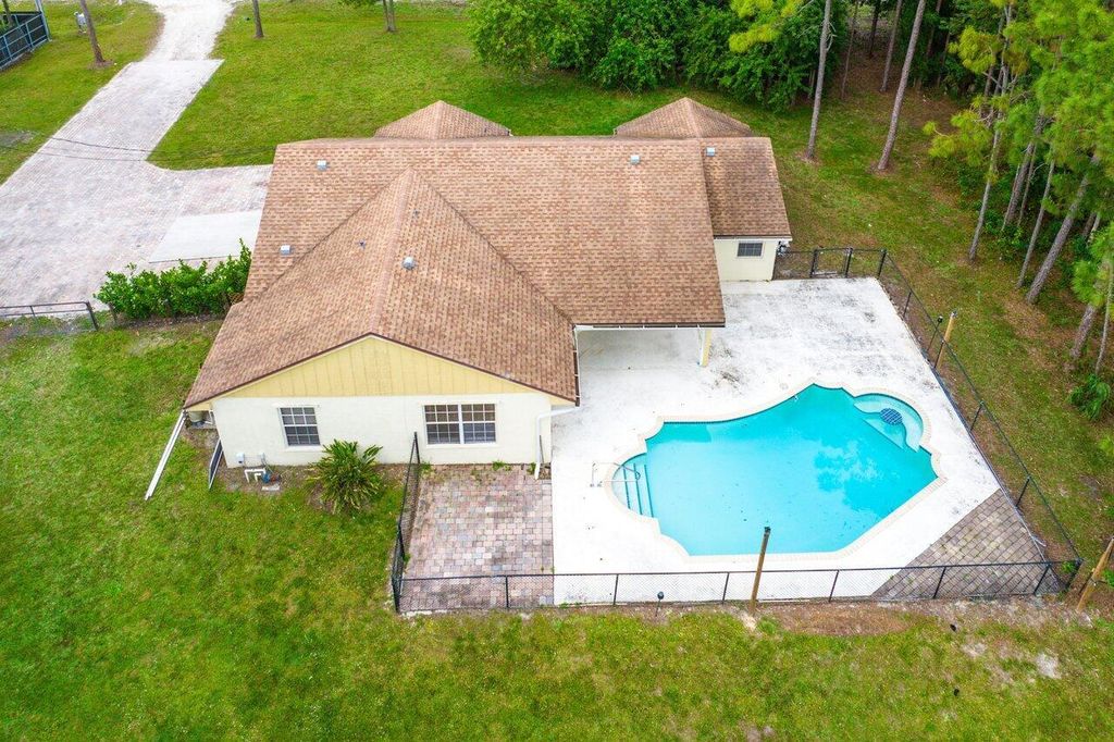 Photo of 13460 71st Place N, West Palm Beach, FL 33412 (MLS # R10967756)