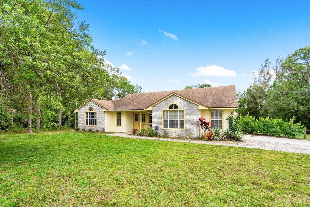 Photo of 13460 71st Place N, West Palm Beach, FL 33412 (MLS # R10967756)