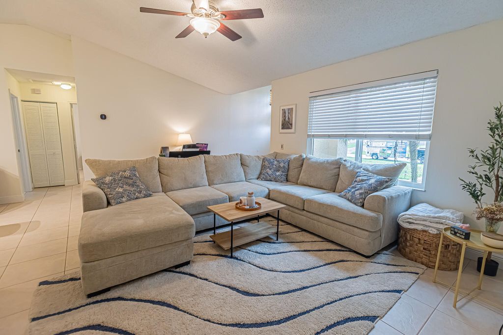 Photo of 1469 SW Leisure Lane, Port Saint Lucie, FL 34953 (MLS # B26019929)