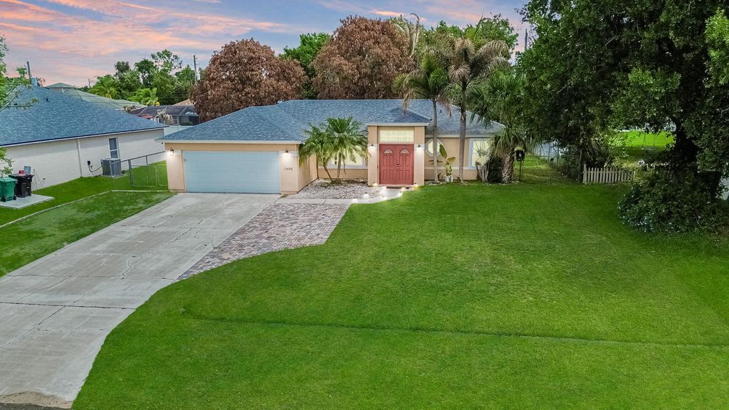 Photo of 1469 SW Leisure Lane, Port Saint Lucie, FL 34953 (MLS # B26019929)