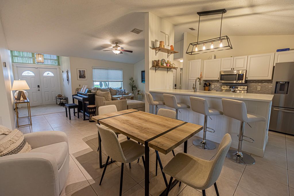 Photo of 1469 SW Leisure Lane, Port Saint Lucie, FL 34953 (MLS # B26019929)