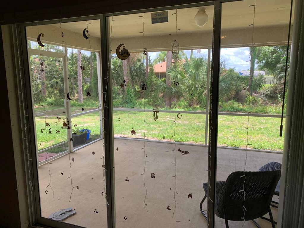 Photo of 1472 SW Melrose Avenue, Port Saint Lucie, FL 34953 (MLS # R11090507)