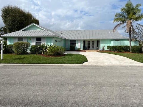Photo of 10691 SE JUPITER NARROWS Drive, Hobe Sound, FL 33455 (MLS # B26087942)