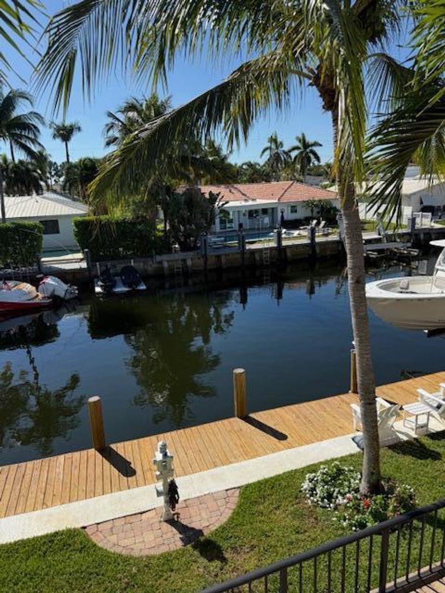 Stunning townhouse located on the intracoastal.  Located in a boating friendly community.  Property includes a private boat dock which accommodates up to 30' vessel. Townhouse was newly renovated, including brand new appliances, countertops, hard wood floors on staircase and much more! Absolutely beautiful and peaceful water views from the 1st floor deck off the living room as well from the master suite balcony upstairs.  Pets welcome 15 lbs and under. Don't miss out on this gem of a property!